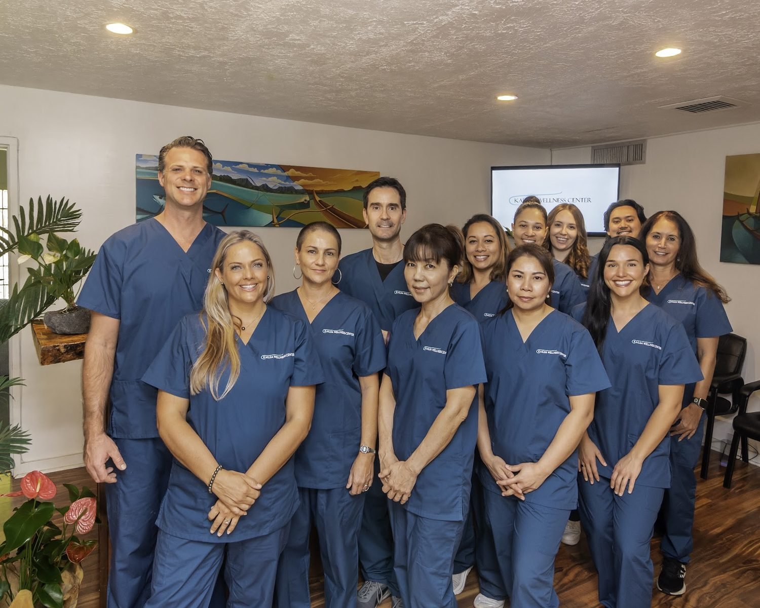 The full Kailua Wellness Center team of chiropractors, therapists and staff together in the clinic